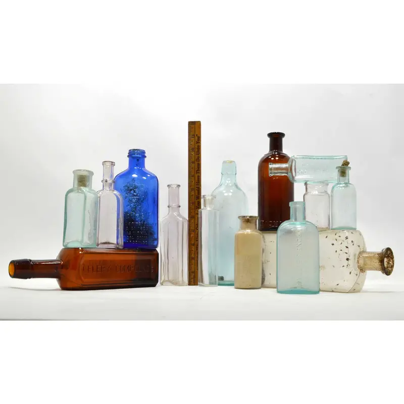 Antique Patent Medicine Bottles – Fourteen Rare Apothecary Elixirs and Tonic Vials