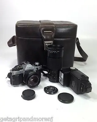 Canon AE-1 35mm SLR Film Camera Bundle – Includes Sunpak 30DX Flash & Tokina 35–200mm Lens