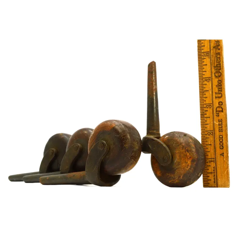 Early Cast Iron Casters — Set of 4 Single-Wheel Wooden Casters (2″) with Aged Patina