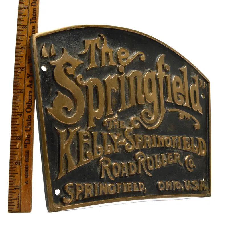 Rare Arch-Top Brass Sign: The Kelly-Springfield Road Roller Co. — Antique Advertising