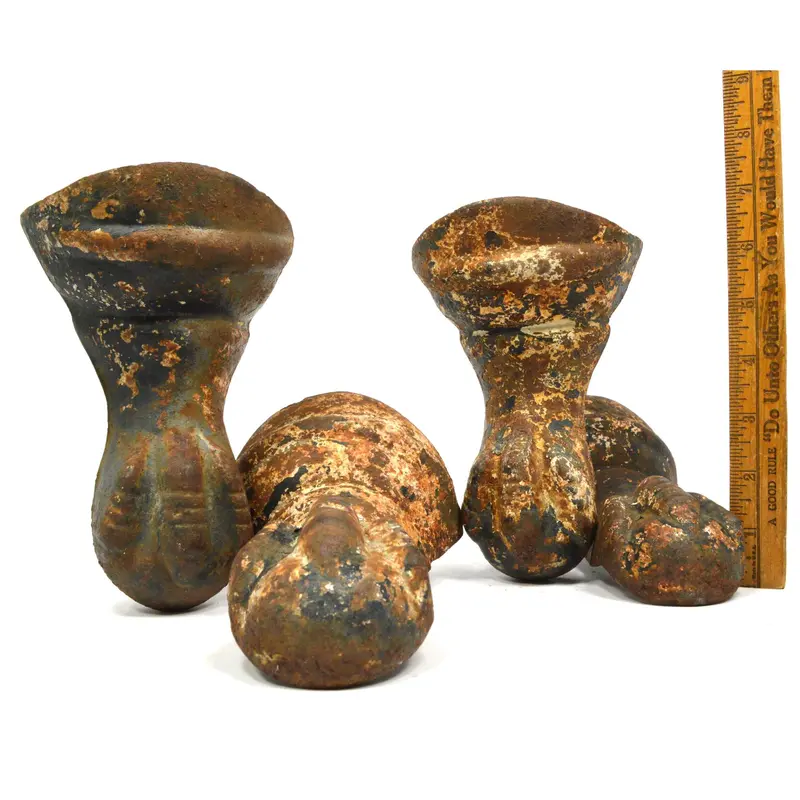 Set of Four Antique Cast Iron Claw-Foot Tub Feet with Patina and Original White Paint