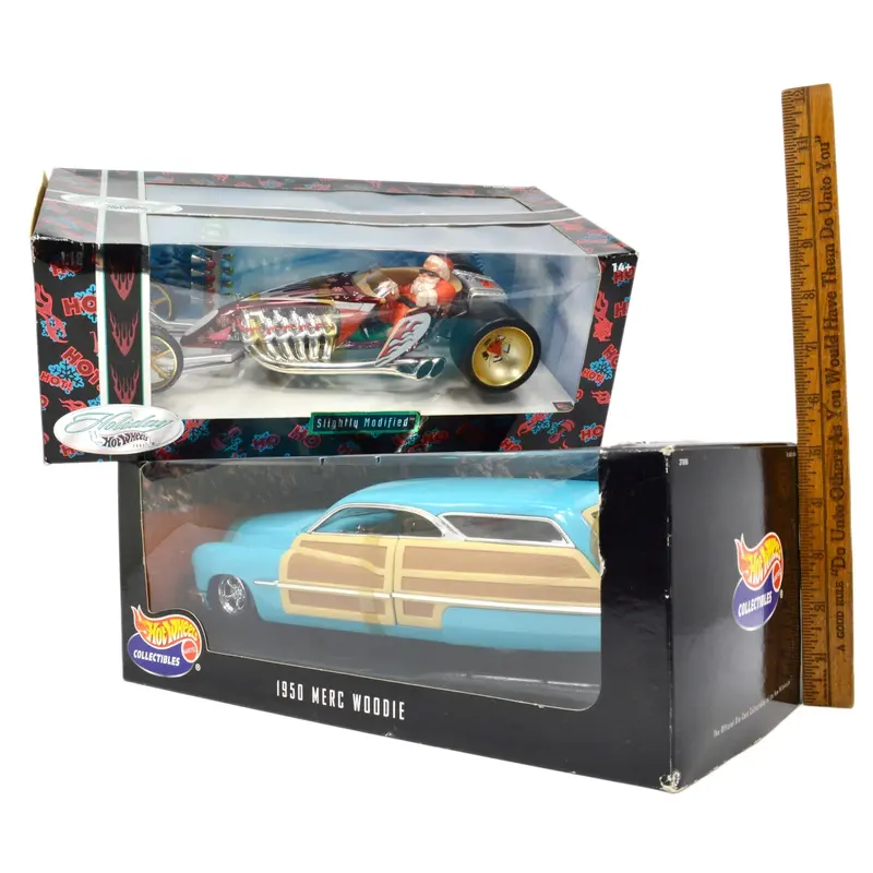 Two 1:18 Hot Wheels Diecast Vehicles – Modified Santa Truck and Mercury Woodie
