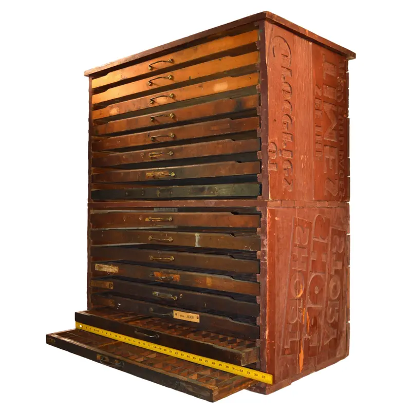 Unique Antique Printer’s Cabinet Featuring 16 Hamilton Drawers and Inverted Advertisements
